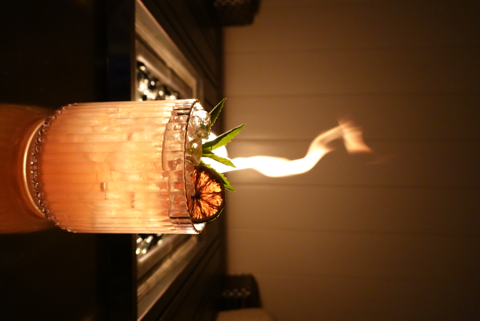 Flaming signature cocktail served by TwoNics.Co bartenders